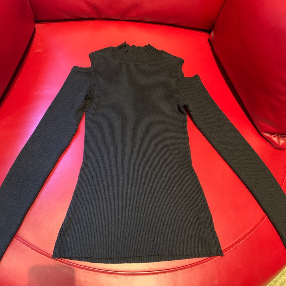 New cut out shoulders, high neck fitted.